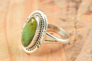 Genuine Crow Springs Turquoise set in Sterling Silver Ring. The Crow Springs Mine is located near Tonopah, Nevada. Created by Navajo Artist Larson Lee.. Signed.